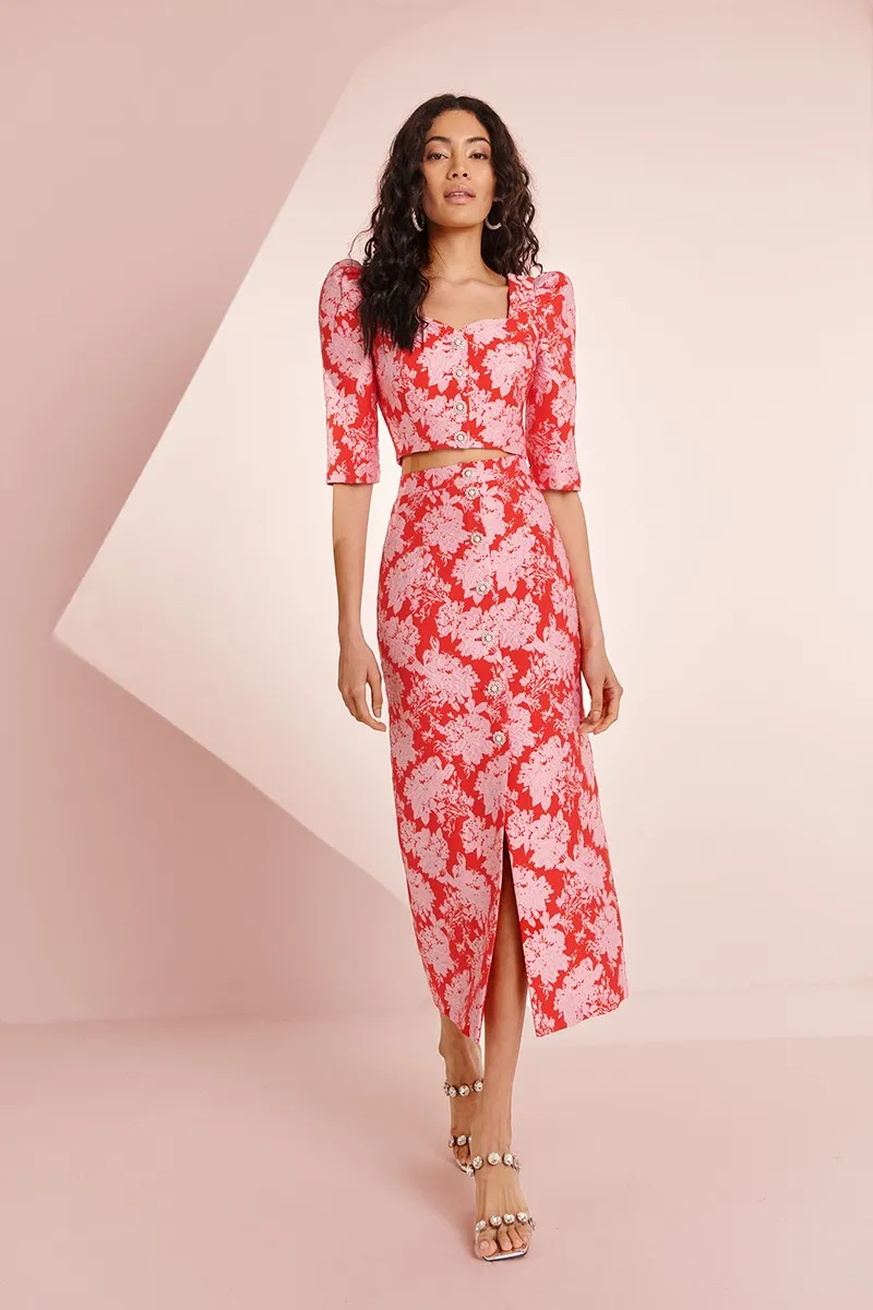 Conjunto top y falda jacquard rojo y rosa con botones joya Rachel
