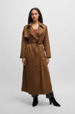 Gabardina con cinturón y detalles metálicos