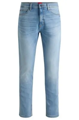 Jeans slim fit en denim elástico azul claro