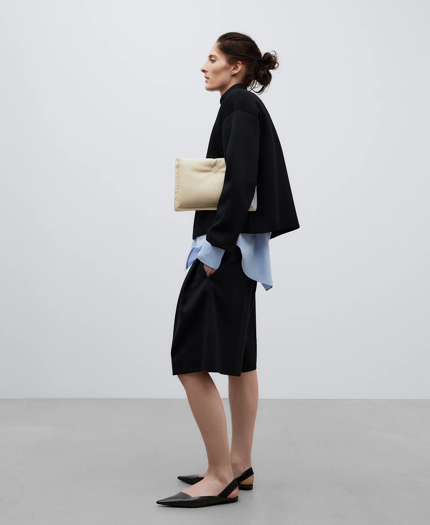 Padded clutch woman
