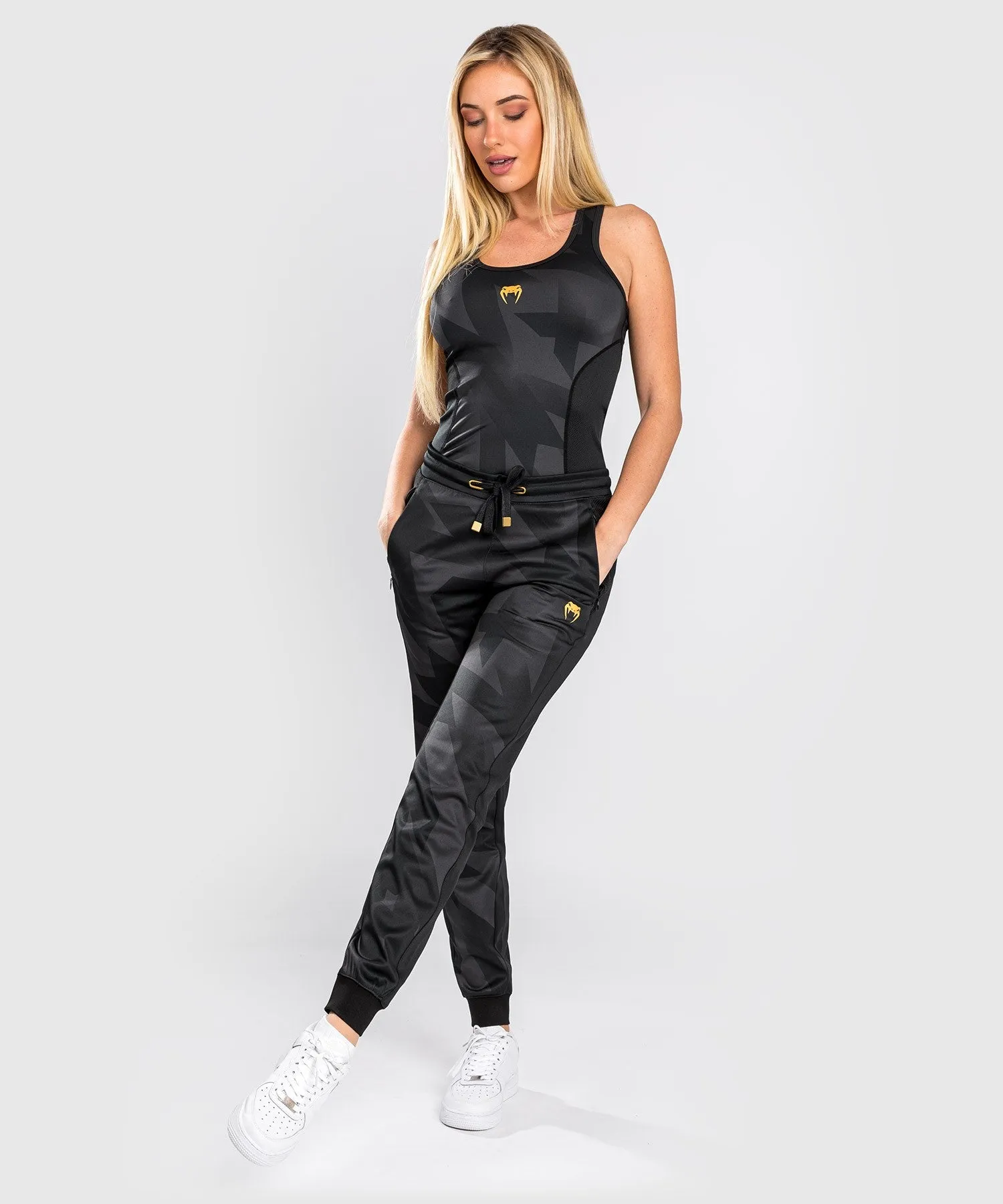 PANTALONES JOGGING VENUM RAZOR  PARA MUJERES  NEGRO/DORADO