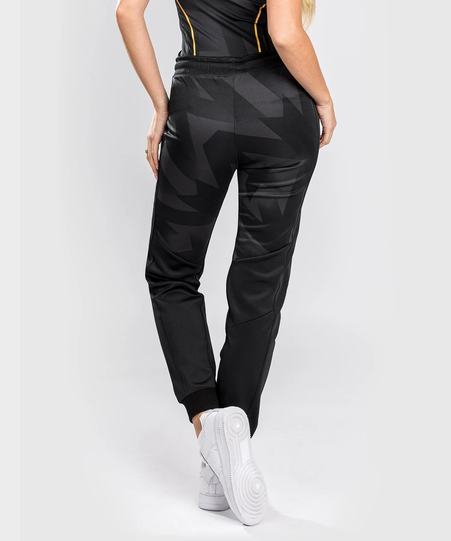 PANTALONES JOGGING VENUM RAZOR  PARA MUJERES  NEGRO/DORADO