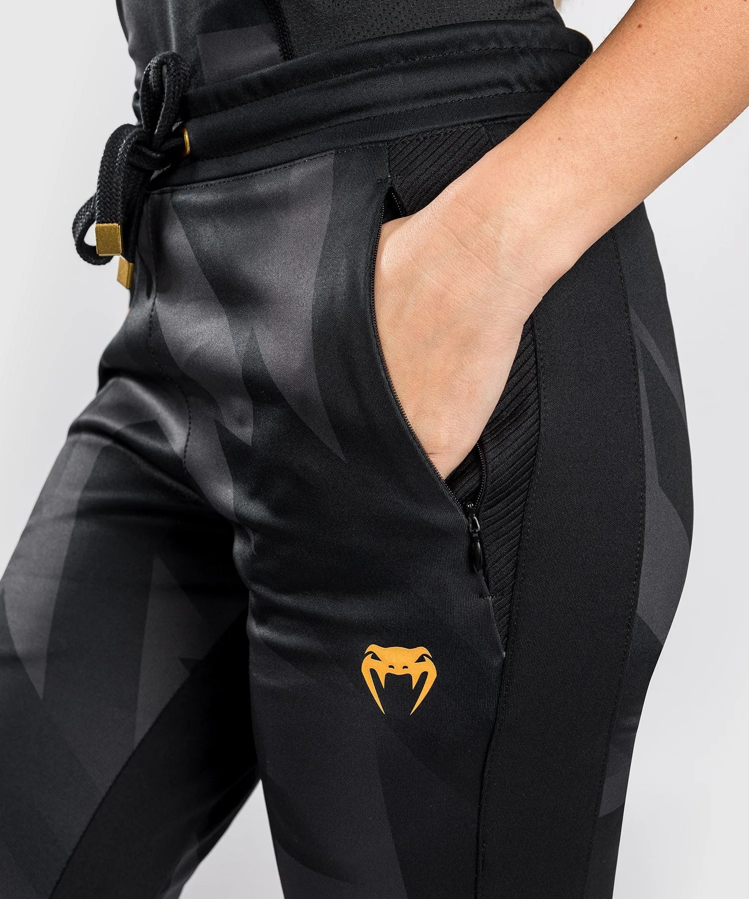 PANTALONES JOGGING VENUM RAZOR  PARA MUJERES  NEGRO/DORADO